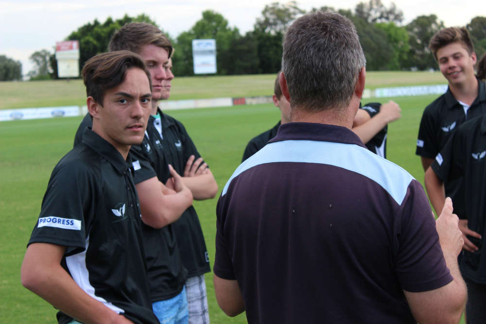Future leaders in Progress Developments sponsored shirts huddle together